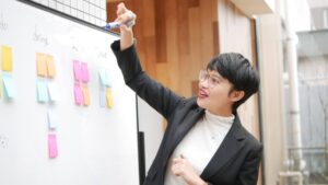 Ms. Vy with whiteboard